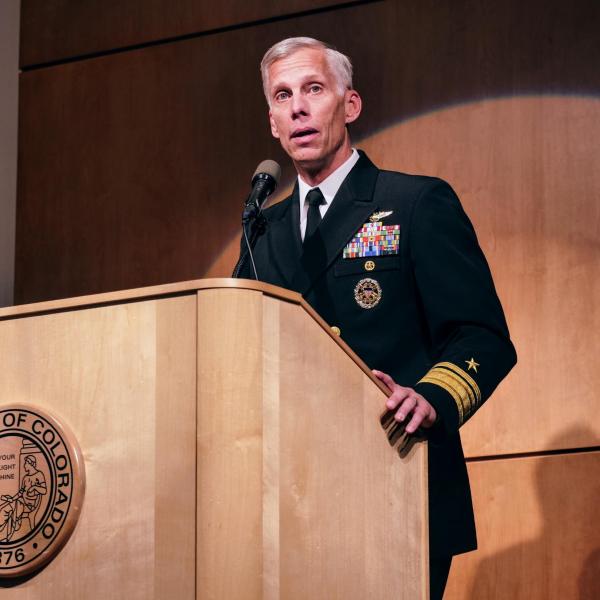 Rear Admiral Richard Snyder provides the keynote speech at the ceremony