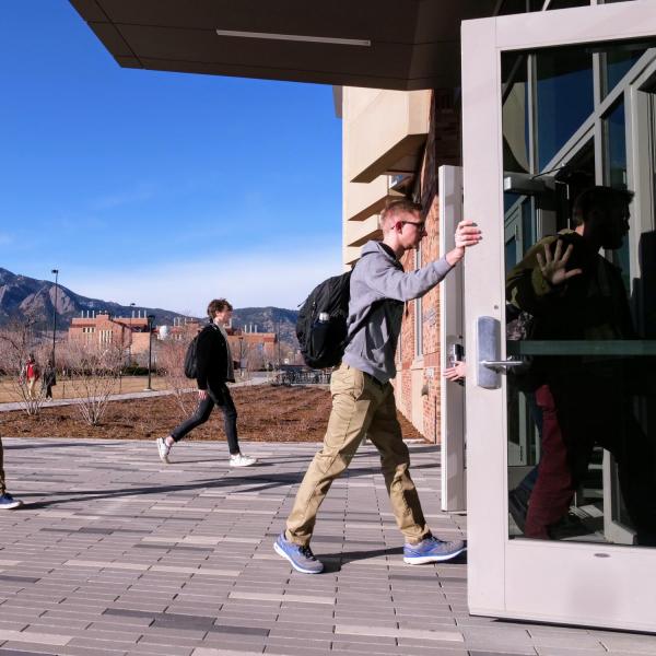 Students enter the Aerospace Engineering Building on the first day of the spring 2020 semester at CU Boulder. (Photo by Patrick Campbell/University of Colorado)