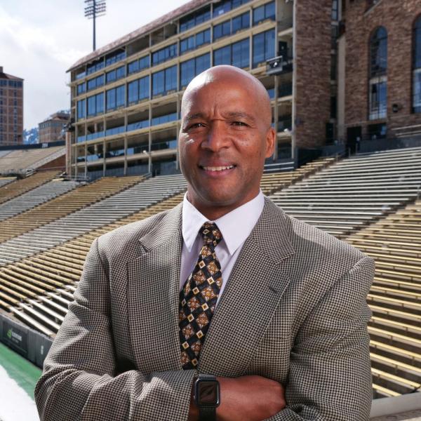 New CU football head coach Karl Dorrell, is photographed outside the Dal Ward Center at Folsom Field. (Photo by Glenn Asakawa/University of Colorado)
