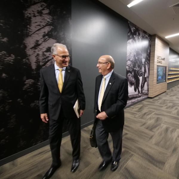 CU President Mark Kennedy chats with CU Boulder Chancellor Phil DiStefano. (Photo by Glenn Asakawa/University of Colorado)