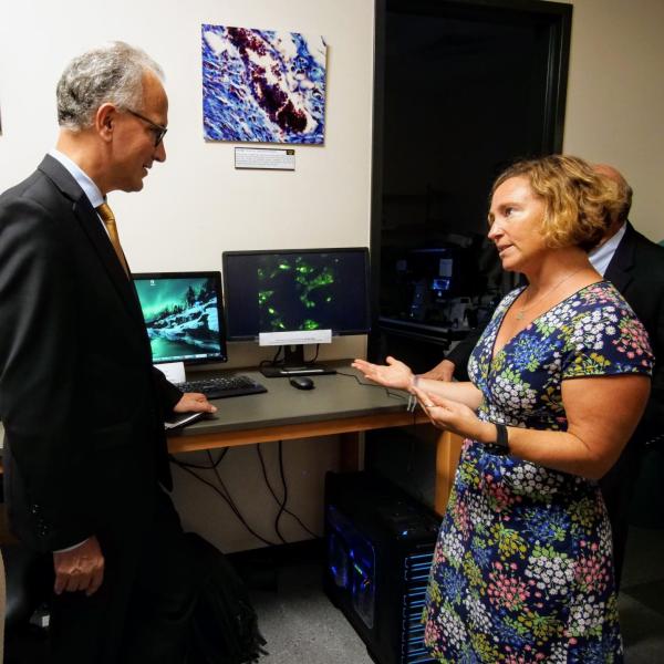 CU President Mark Kennedy, left, is seen during a tour of campus. (Photo by Glenn Asakawa/University of Colorado)