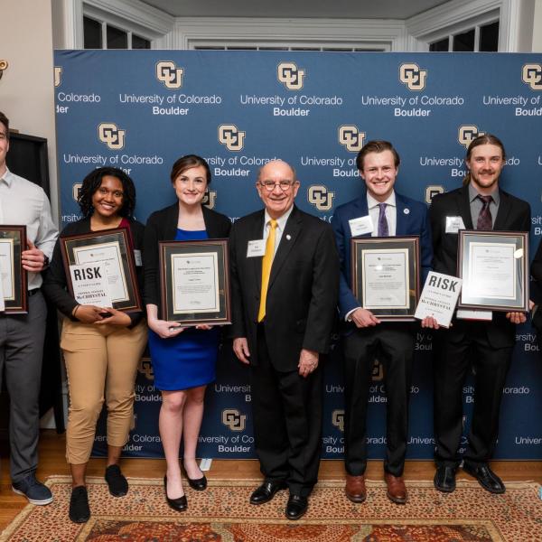 Chancellor Philip DiStefano poses for a group photo with the six Student Leader of the Year award recipients.