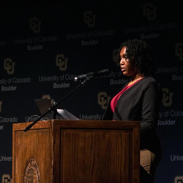 Areyana Proctor, a Student Leader of the Year award recipient, introduces General Stanley McChrystal.