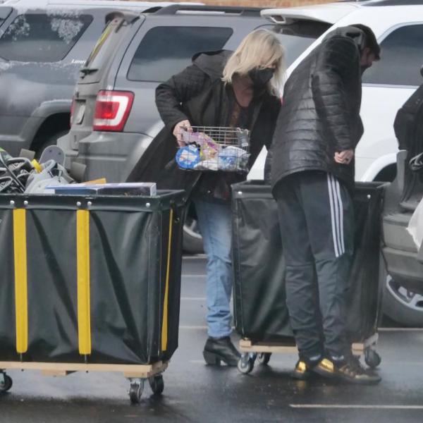 A student moves their belongings during Move-In Day on Feb. 8, 2021, at Williams Village at CU Boulder. (Photo by Casey A. Cass/University of Colorado)
