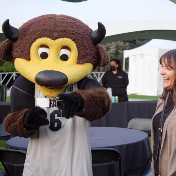 Graduates from the class of 2020 and 2021 gather for a celebratory evening at the Night on Norlin event on Sept. 17, 2021. (Photo by Glenn Asakawa/University of Colorado)