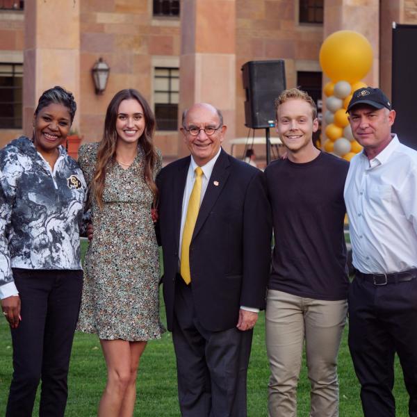 Dwinita Mosby Tyler, far left, Chancellor Philip DiStefano, center, and Dan Carlin, far right, meet at the Night on Norlin event on Sept. 17, 2021. (Photo by Glenn Asakawa/University of Colorado)