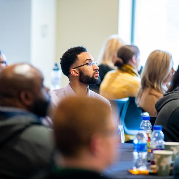 Attendees listen to the 2020 Inclusive Sports Summit morning keynote address at CU Boulder. (Photo by Patrick Wine/University of Colorado)