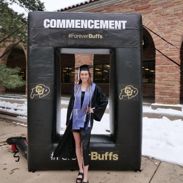 Allie Shea Reuter poses at the 2021 Graduation Appreciation Days photo posing station outside the UMC at CU Boulder. (Photo by Casey A. Cass/University of Colorado)