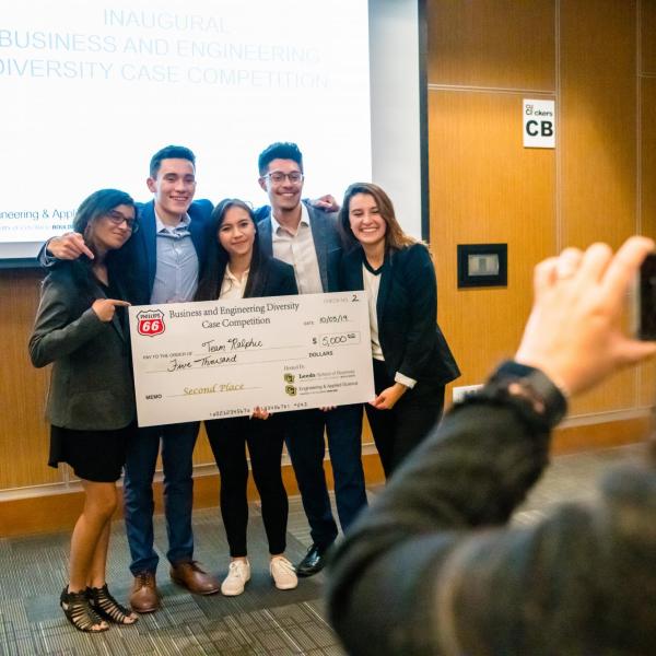 Students from the Leeds School of Business and the College of Engineering combine their skills to work on a competitive case study for Phillips 66, bridging the gap between business and engineering. (Photo by Patrick Wise/University of Colorado)