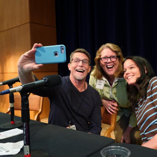 Chef Rick Bayless poses for selfie with fellow panelists