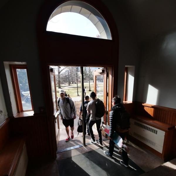 Students file through a doorway in the Hale Science building. Photo by Casey A. Cass.