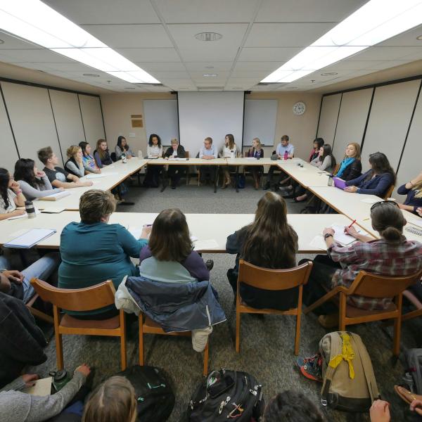 Standing room only for session titled "Weathering the Storm: Personal and Community Tools for Reducing the Impact of Oppression"