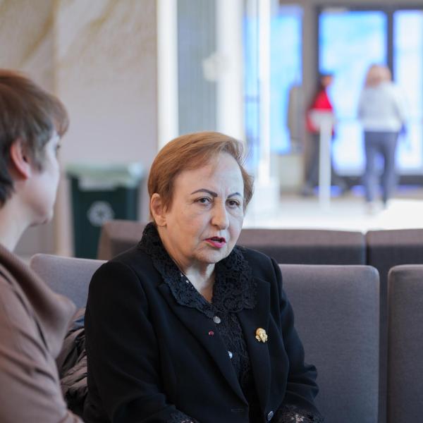 Shirin Ebadi of Iran talks with guests before a screening of a biographical film about her and a Q&A. (Photo by Glenn J. Asakawa/University of Colorado)