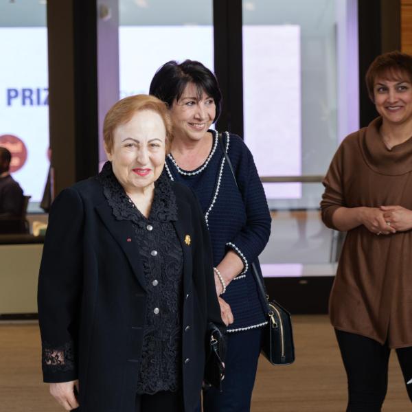 Shirin Ebadi of Iran, far left, greets Ann Schmiesing, executive vice provost for academic resource management. (Photo by Glenn J. Asakawa/University of Colorado)