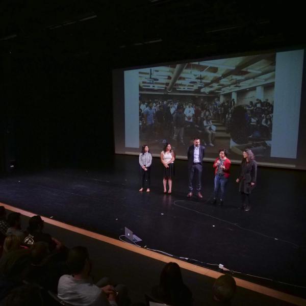 Presenters answer questions during the Q&A session of the School of Education's Ed Talks at the Dairy Arts Center. Photo by Patrick Campbell.