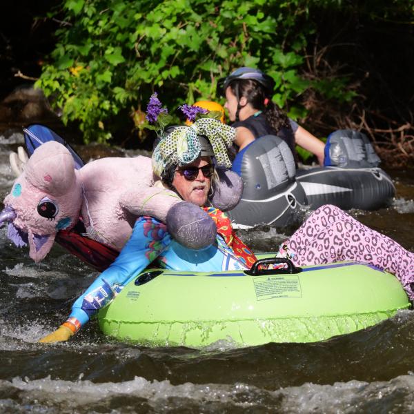Tubers ride the Boulder Creek during Tube to Work Day 2017