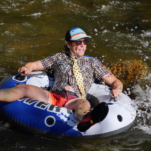 Tubers ride the Boulder Creek during Tube to Work Day 2017