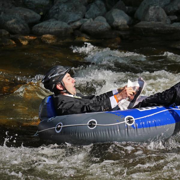 Tubers ride the Boulder Creek during Tube to Work Day 2017