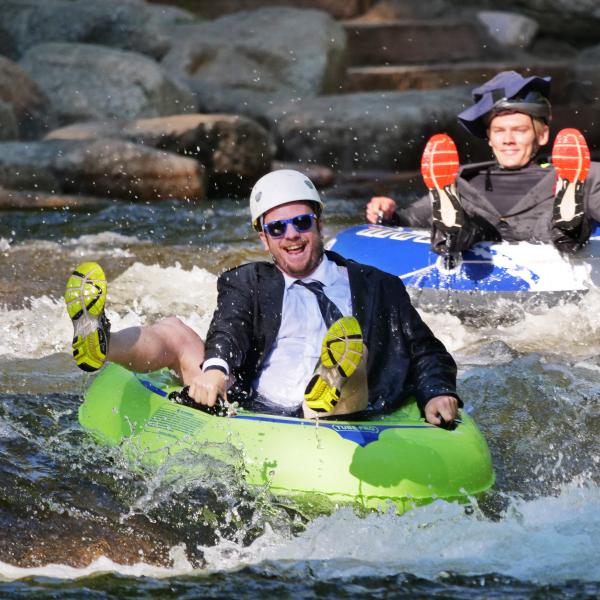 Tubers ride the Boulder Creek during Tube to Work Day 2017