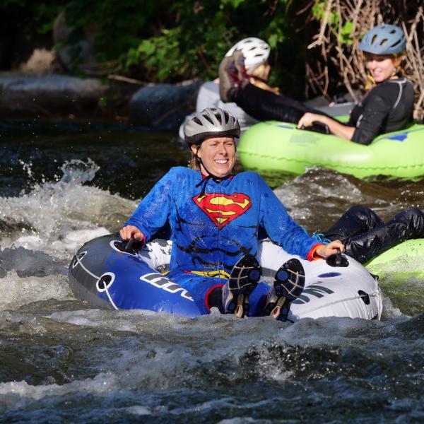 Tubers ride the Boulder Creek during Tube to Work Day 2017