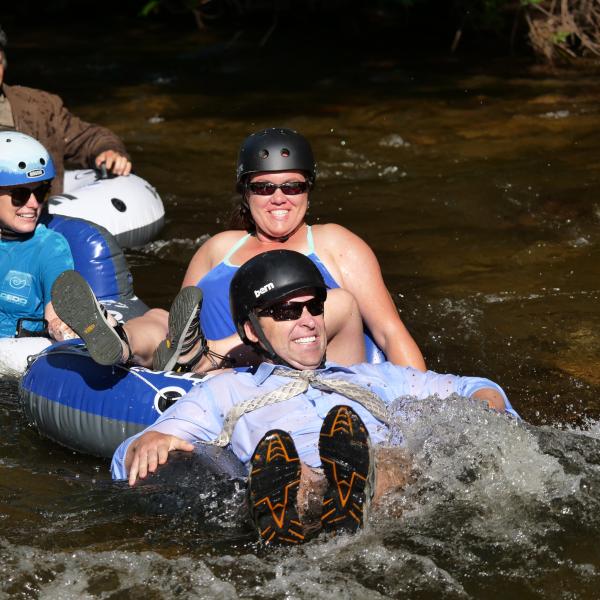Tubers ride the Boulder Creek during Tube to Work Day 2017