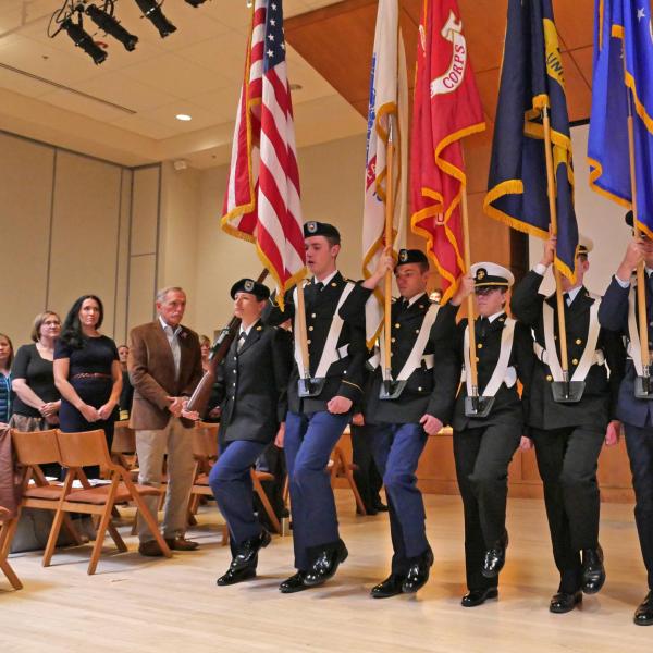 The Joint ROTC Color Guard presents during the Veterans Day Ceremony in the University Memorial Center. Photo by Casey A. Cass.