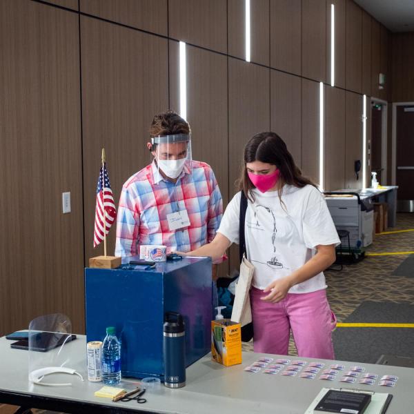 Students cast their ballots at a polling place in the Williams Village Center at CU Boulder. (Photo by Patrick Campbell/University of Colorado)