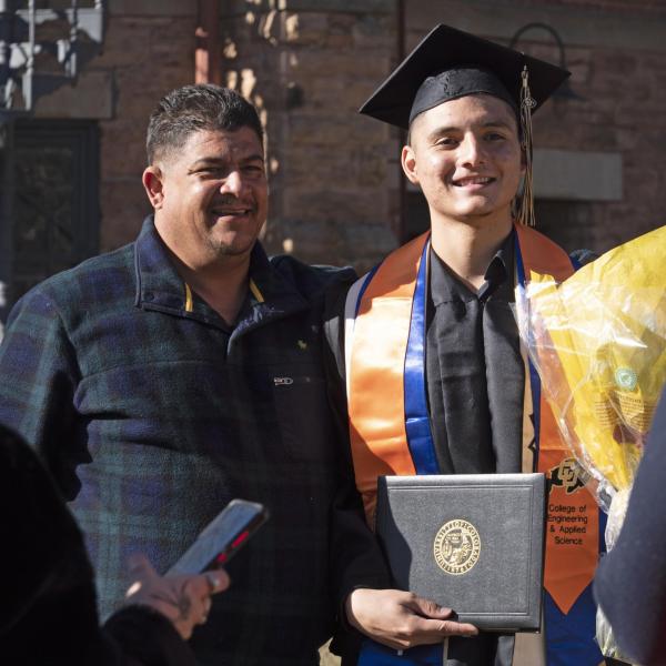 Graduates and families celebrating 2021 winter conferral. Photo by Casey A. Cass.