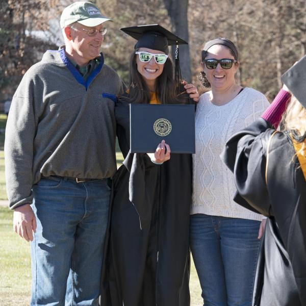 Graduates and families celebrating 2021 winter conferral. Photo by Casey A. Cass.