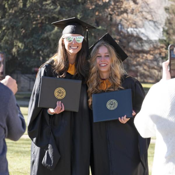 Graduates and families celebrating 2021 winter conferral. Photo by Casey A. Cass.