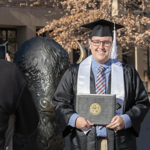 Graduates and families celebrating 2021 winter conferral. Photo by Casey A. Cass.