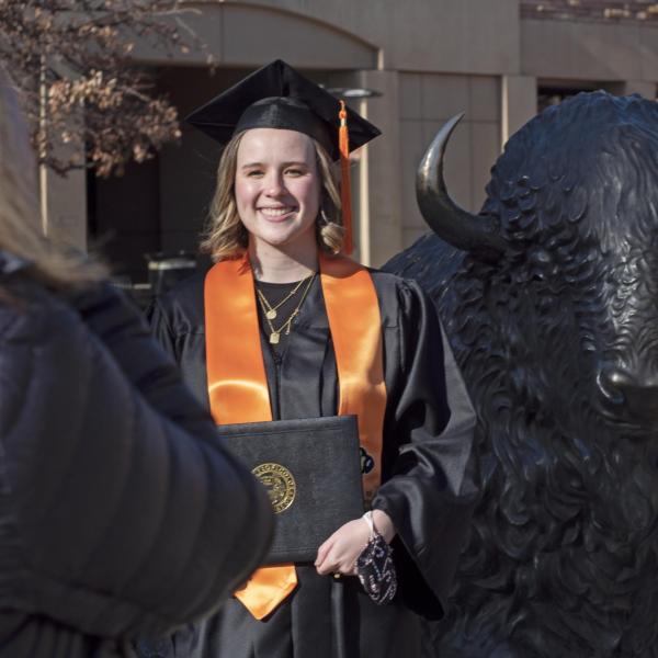 Graduates and families celebrating 2021 winter conferral. Photo by Casey A. Cass.