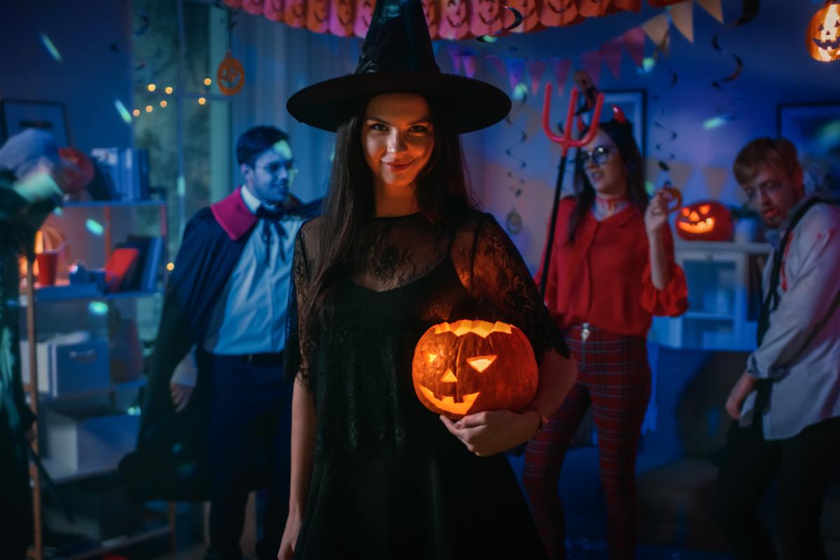 adults dressed up in Halloween costumes
