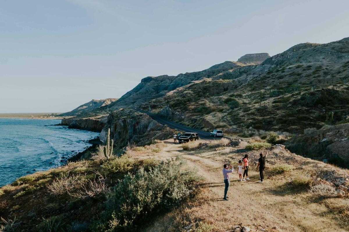 People on a rocky coast.