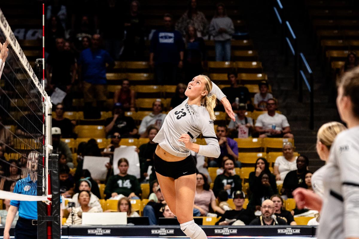 CU volleyball player in action