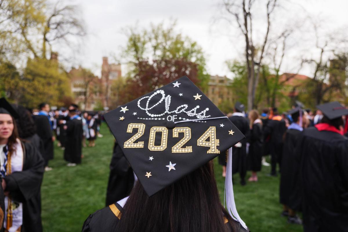 A decorated graduation cap during commencement ceremony
