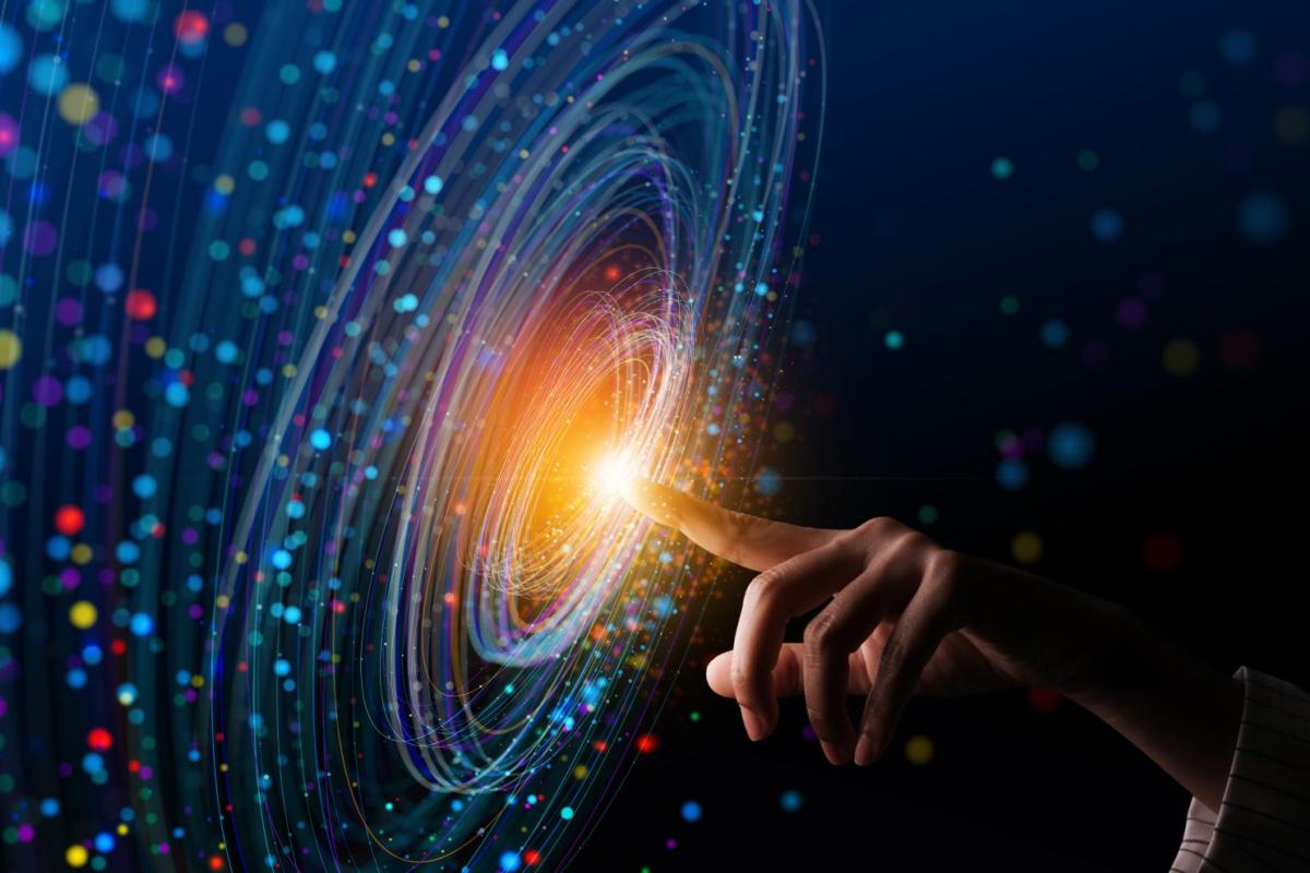 A hand touching a digital neural network