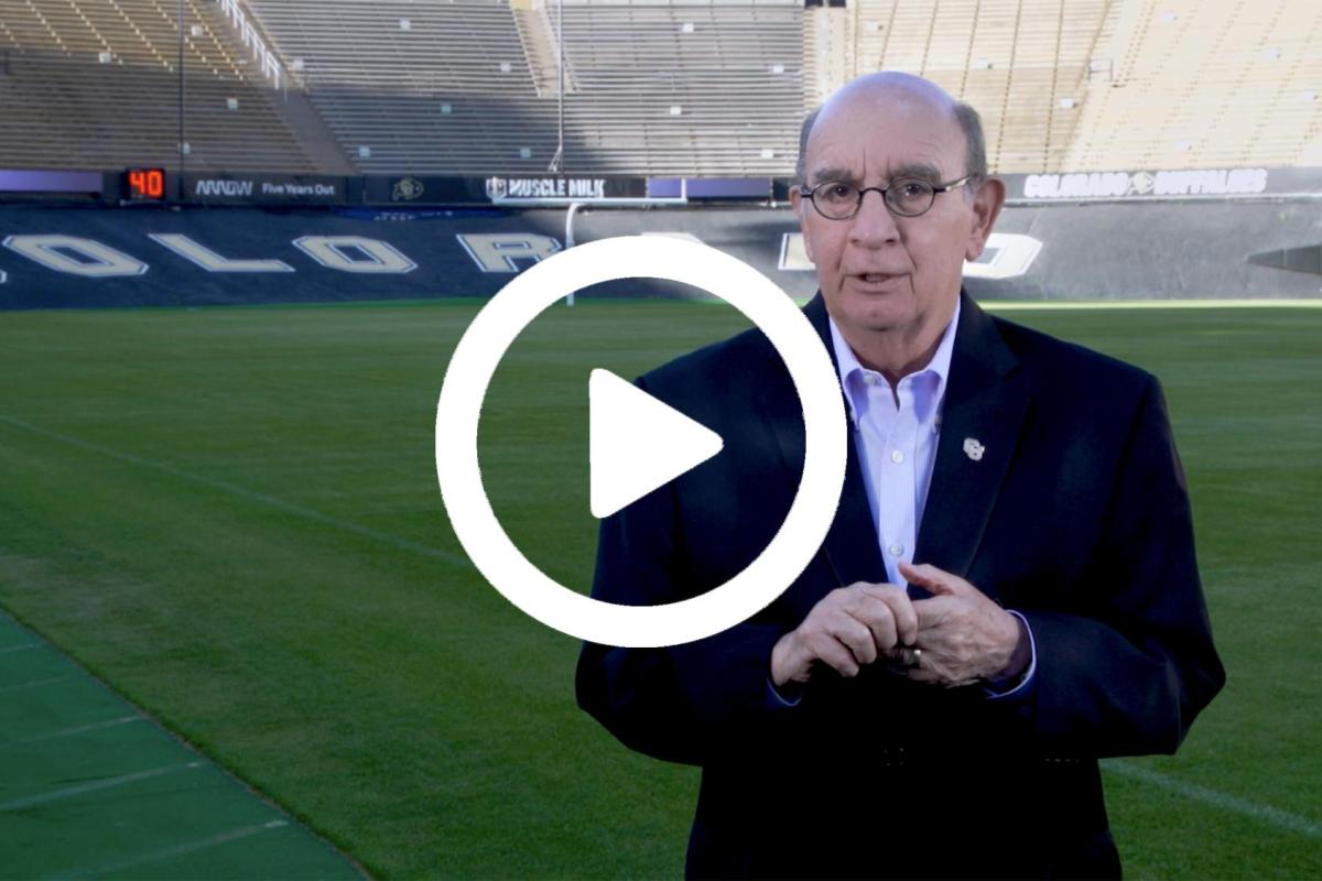Chancellor Phil DiStefano with video play button overlay