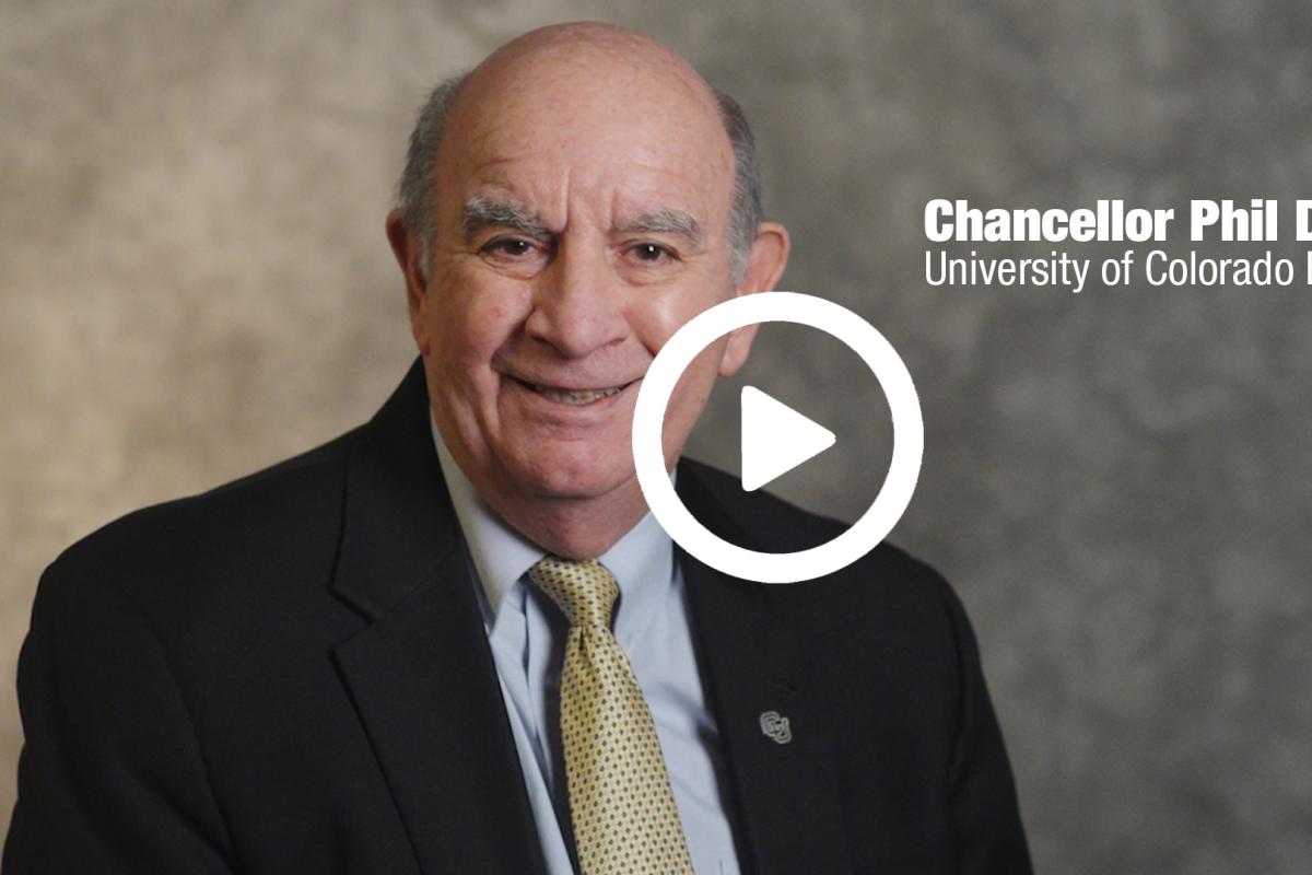 Chancellor Phil DiStefano with a video play button overlay