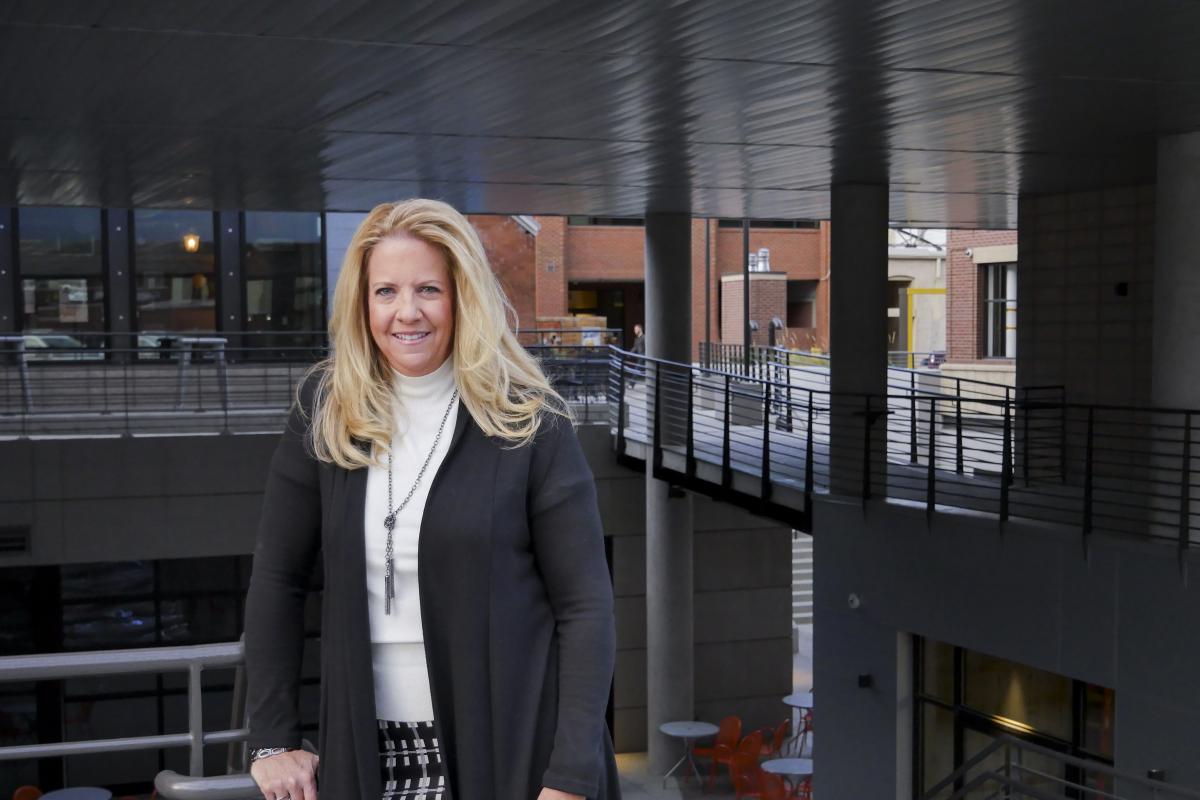 Cynthia Banks poses in front of The Hub in downtown Boulder