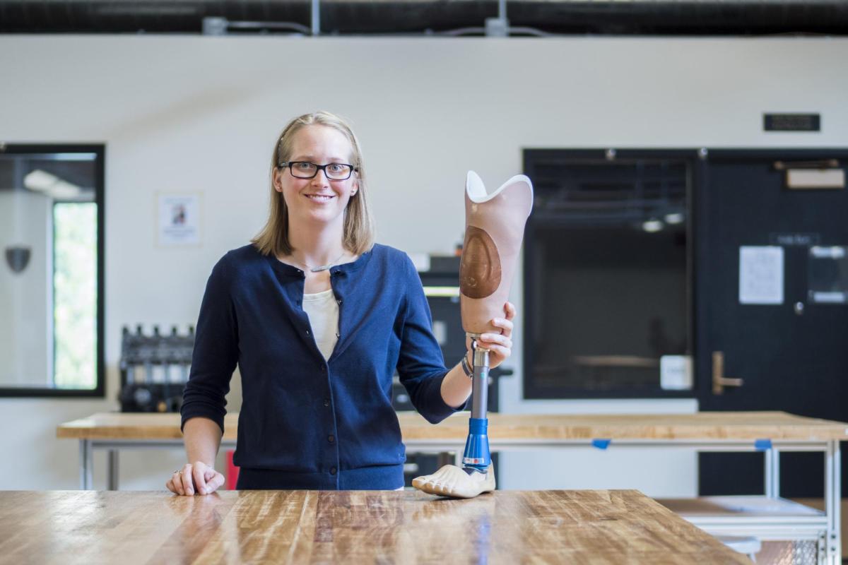 Madalyn Kern stands in the Idea Forge with a prosthetic leg