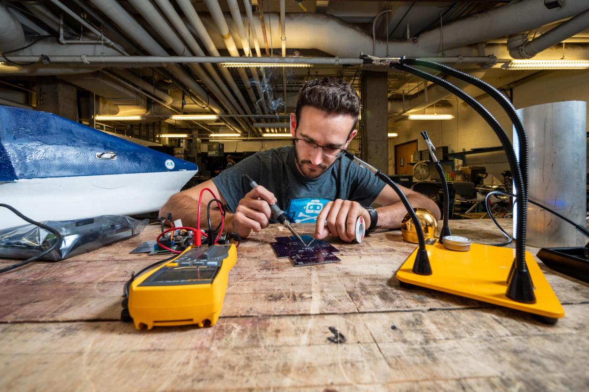 Earl Potters working on his roboboat.