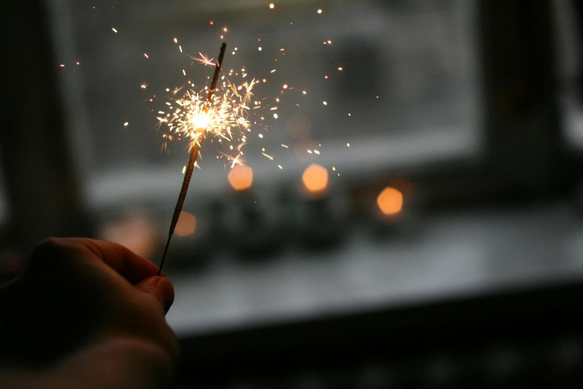 Someone holding a small sparkler