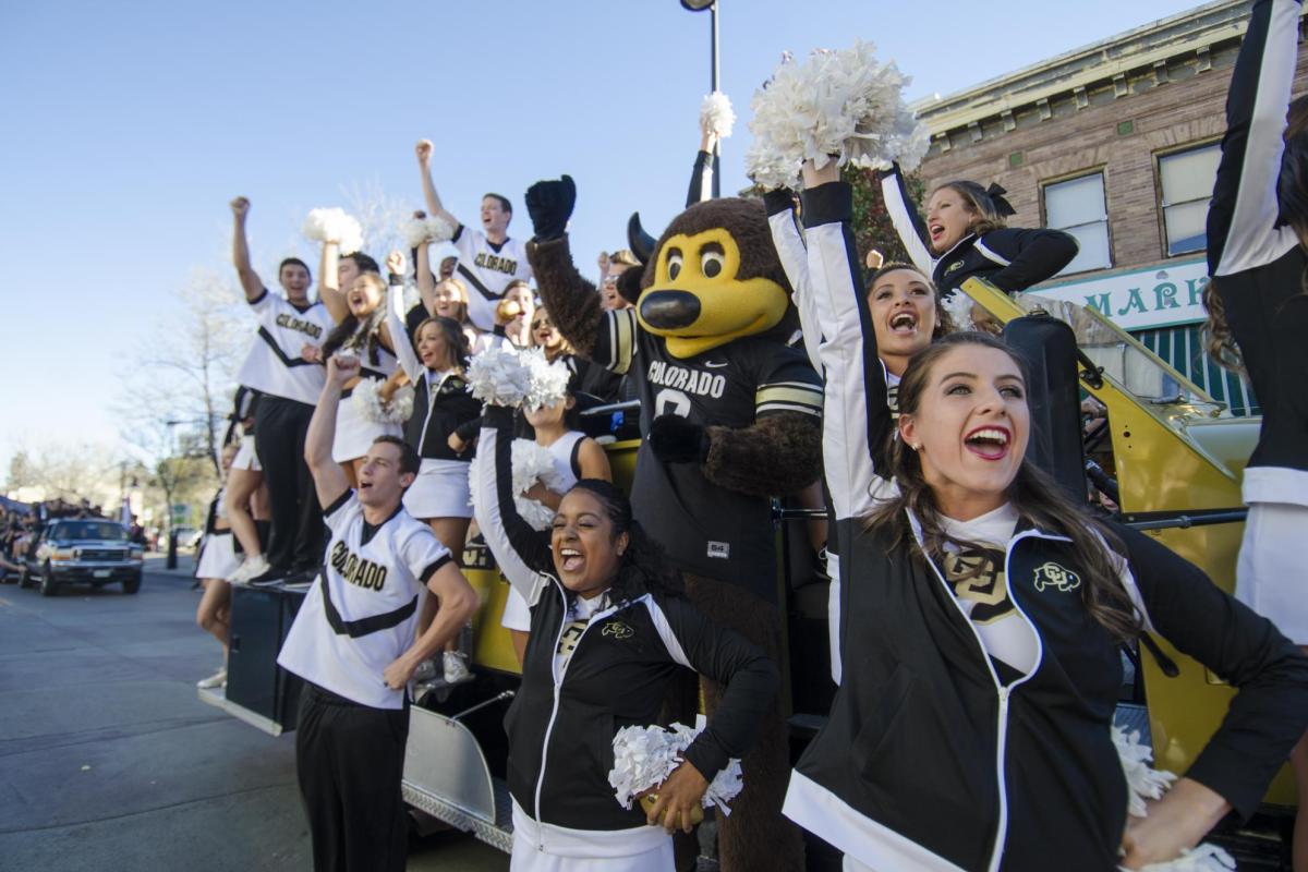 Chip and CU cheerleaders root for the Buffs