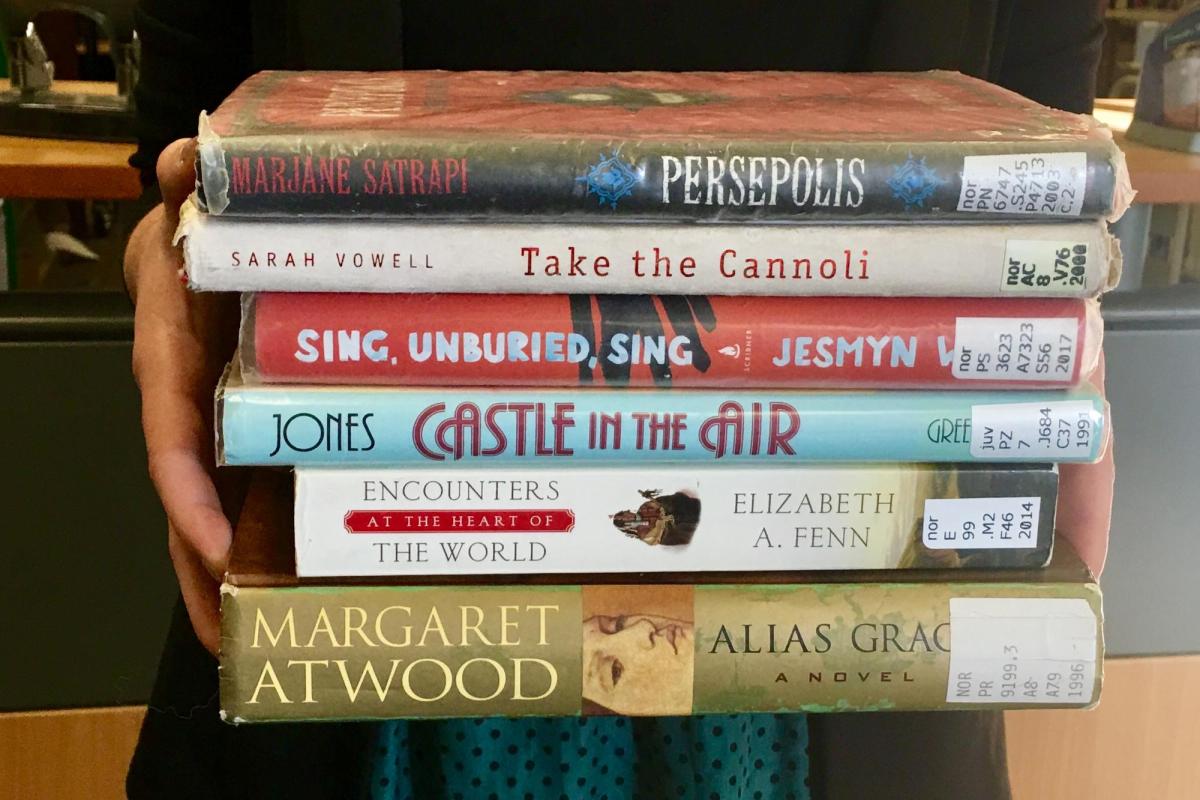 Example titles by authors who were community picks for Norlin Libary display