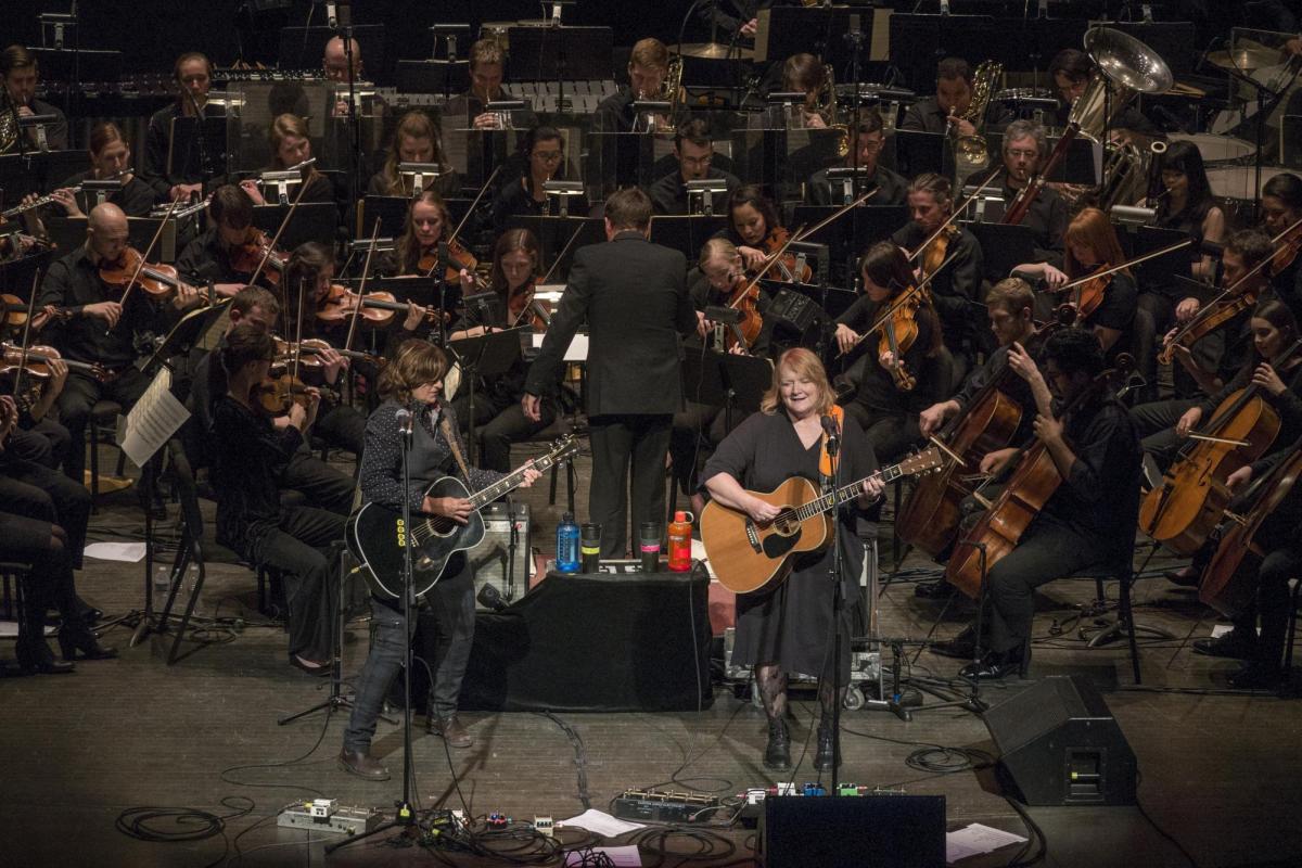Indigo Girls performing with the CU Symphony Orchestra in Macky Auditorium