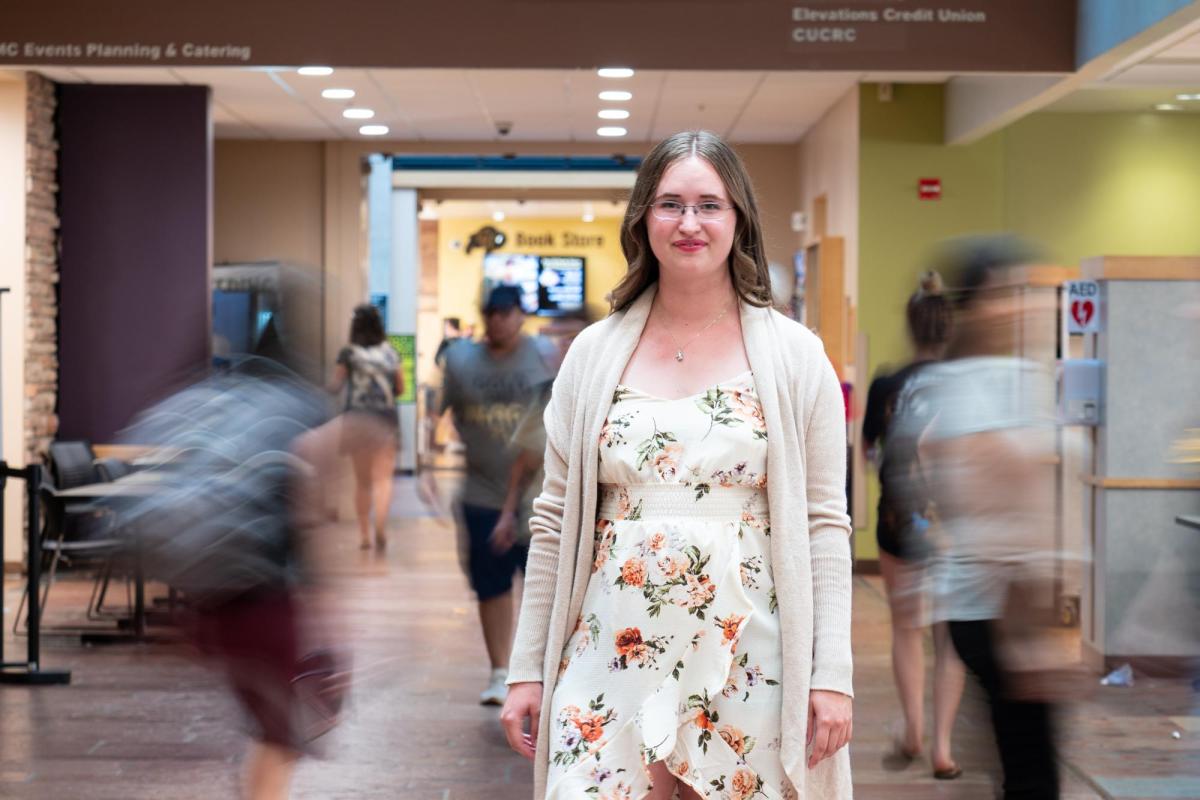 Michelle Galetti stands among students in the UMC.