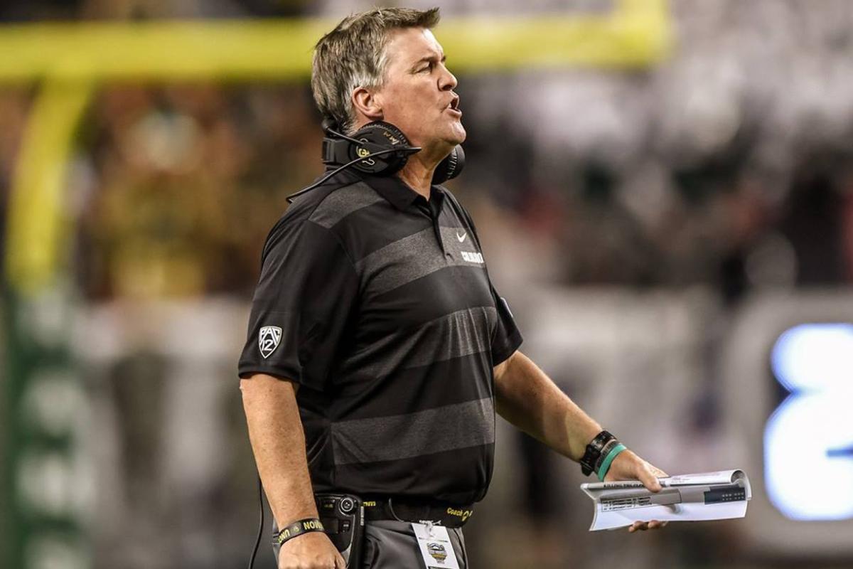Mike MacIntyre coaching during game
