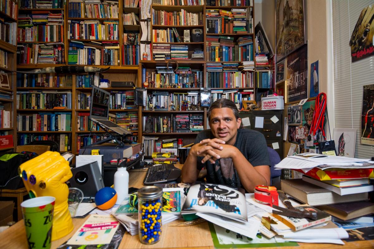 Stephen Graham Jones at desk