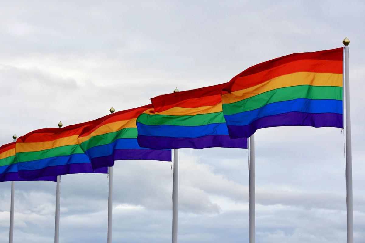 Pride flags blow in the wind